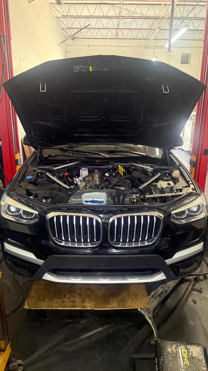 BMW engine opened up for service at the shop